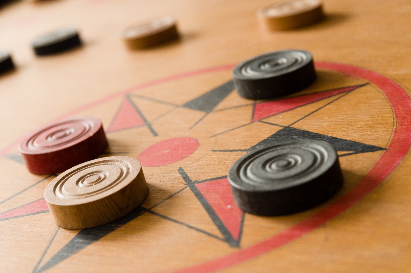 Principles That Drive the Game of Carrom 5